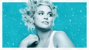 Birks Holiday Campaign - a woman wearing a crown of pine branches wearing new pieces of Birks Holiday collection